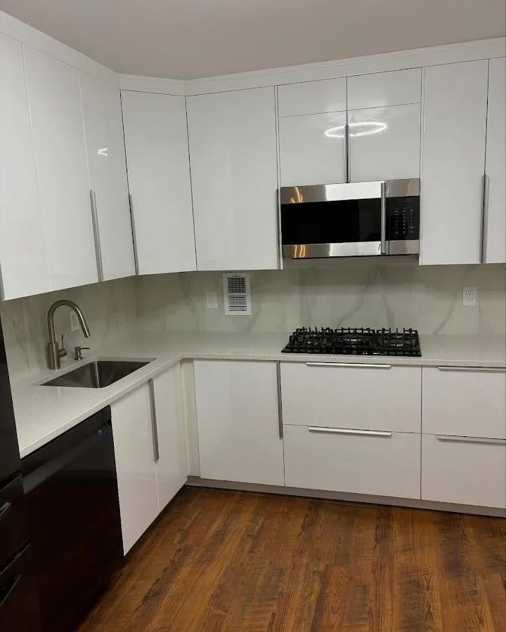 Restored kitchen with white cabinets after water damage in Schenectady